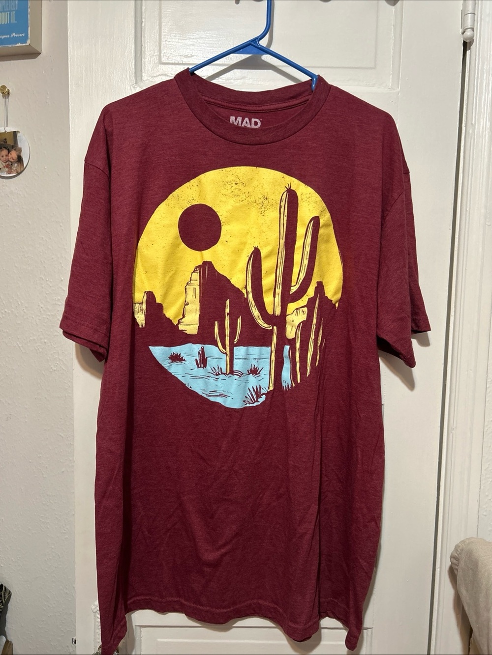 MAD Engine Maroon Short‑Sleeve Desert Graphic Tee with Yellow & Light Blue Print